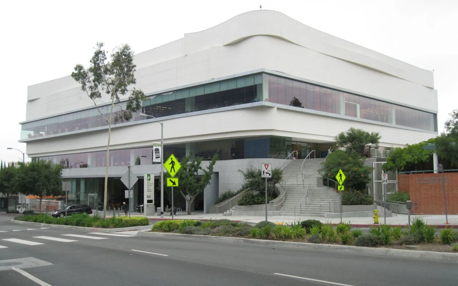West Hollywood Library building viewed from the street in front of the Pacific Design Center